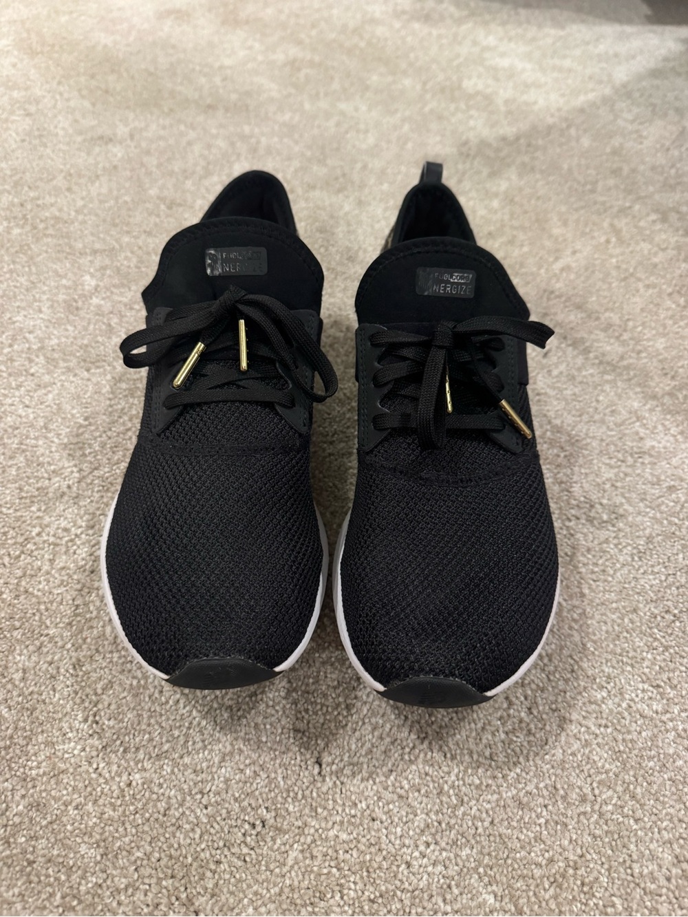 New Balance Women’s black/leopard print sneakers